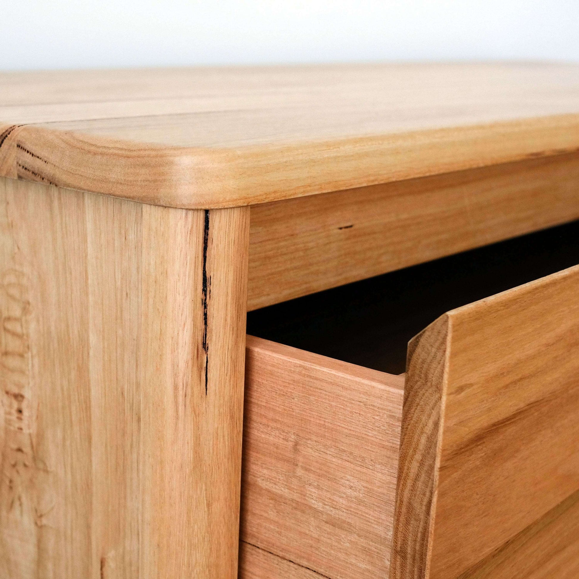 Close-up of a messmate cabinet with a visible grain pattern.