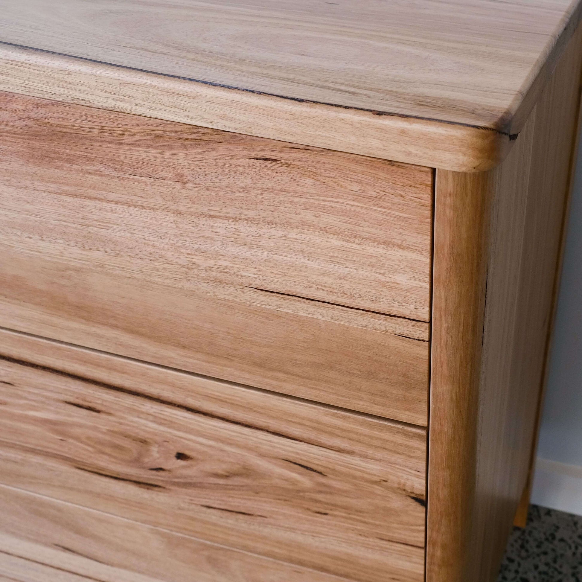 Close-up of Mayfield Sideboard in Wormy Chestnut showing fine timber grain and modern dresser design features.