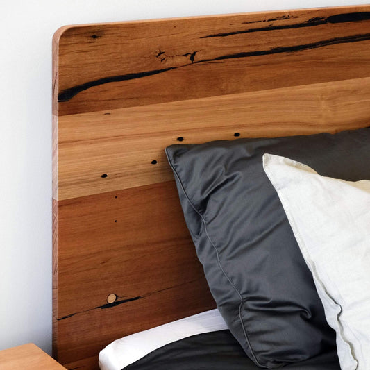 Close-up of Plymouth Panel Timber Bed headboard made from recycled timber with a sleek design and natural finish.