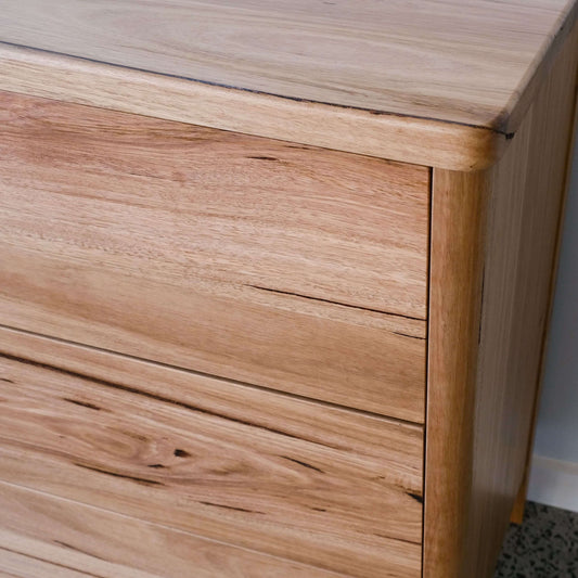 Close-up of Mayfield Sideboard in Wormy Chestnut showing fine timber grain and modern dresser design features.